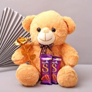 Golden Elegance with Teddy and Chocolates