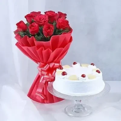 Eggless Pineapple Cake Half Kg with 6 Roses